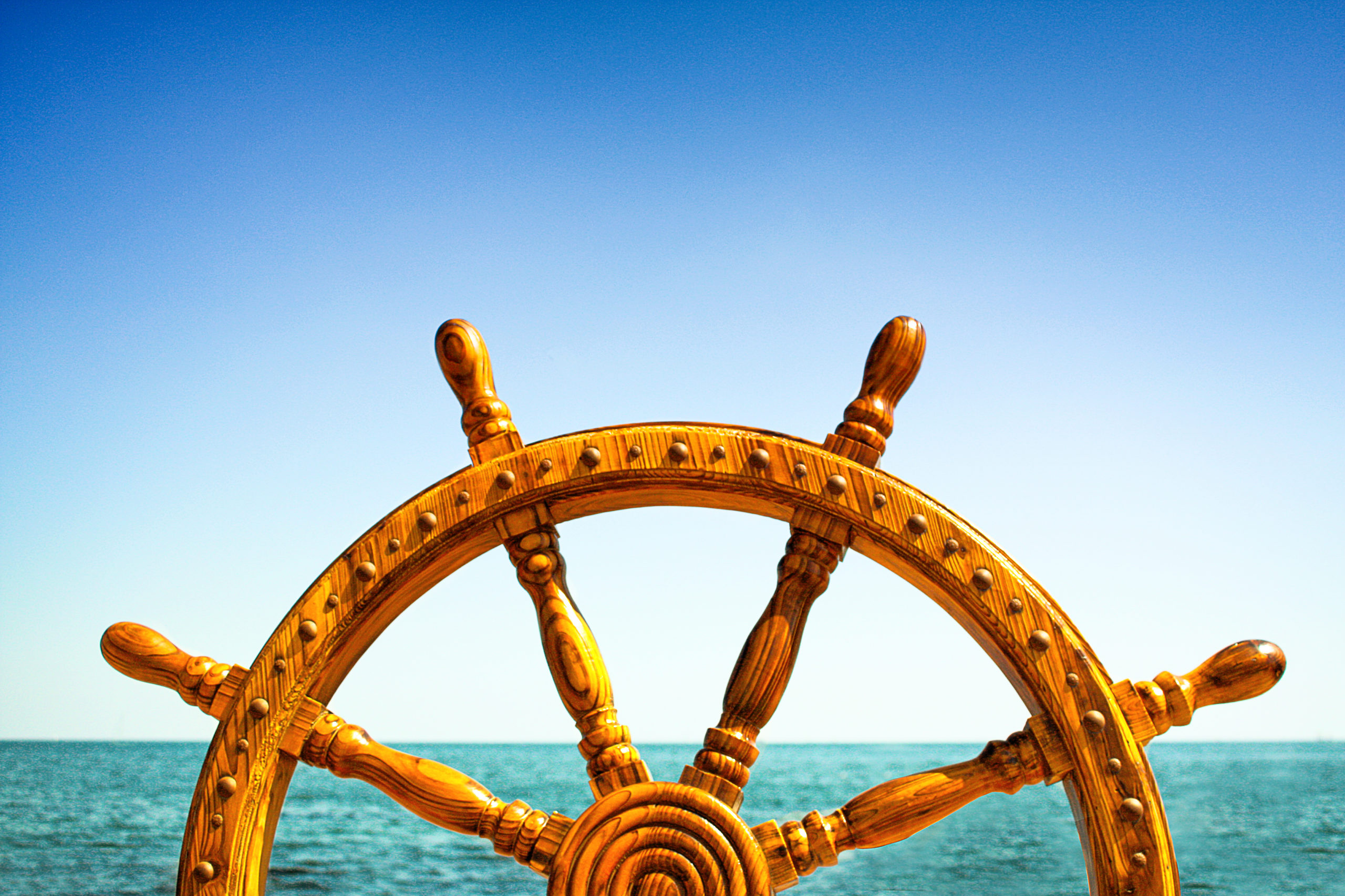 wooden steering wheel of a ship