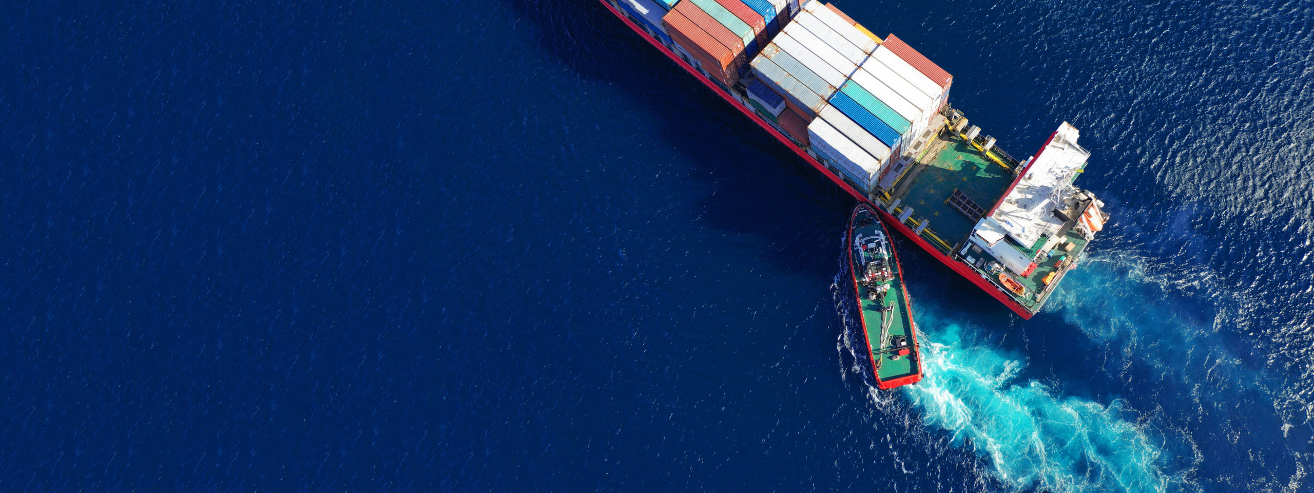 aerial shot of container ship in deep sea